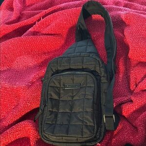 Like New Reebok Black Quilted Sling Bag